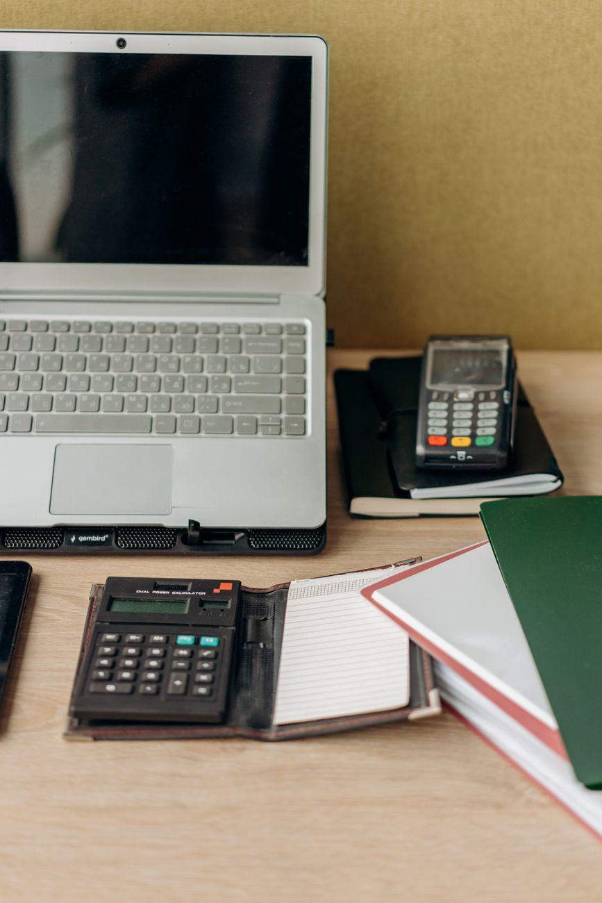 Canadian tax calculation workspace with tablet and documents