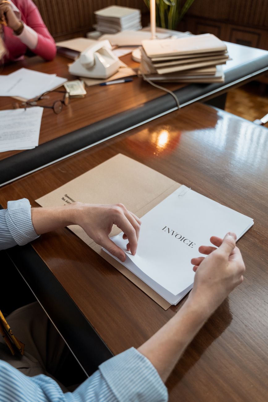Close-up view of business files and calculator